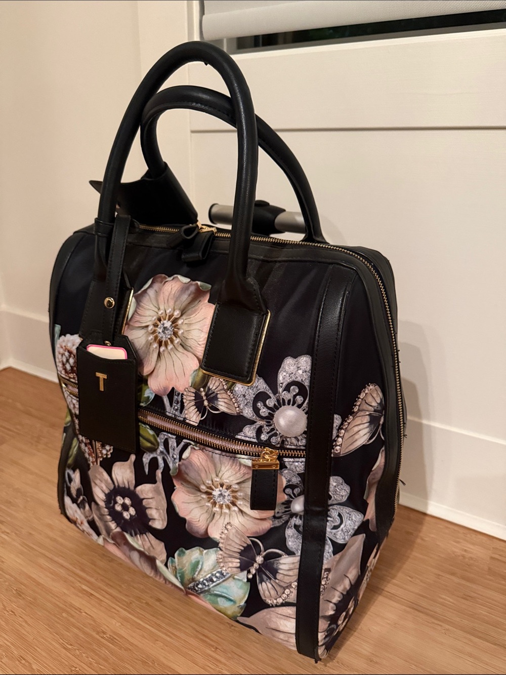 Ted Baker Black Floral travel bag with wheels and Handle